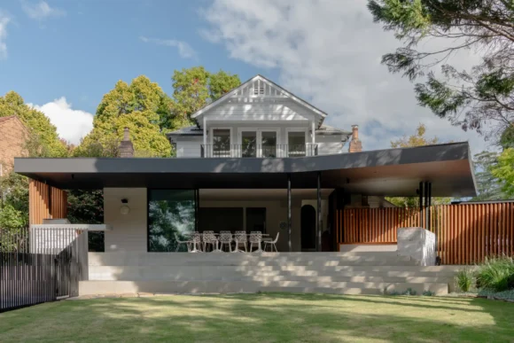 Modern rear extension with cantilevered awning at Pymble home renovation by Lou Projects